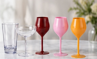 Clear highball and coupe with burgundy, pink and orange wine glasses