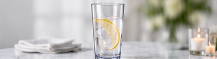 Lemon and ice in a reusable highball at an event